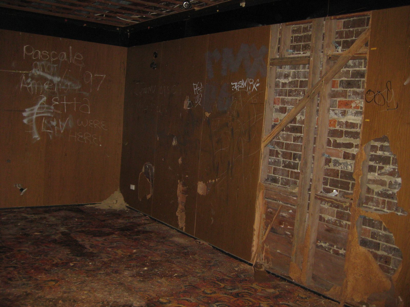 Derelict interior of the Howson Oval sports building before restoration